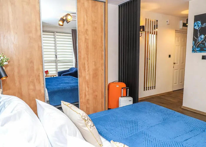 - Hotel apartamentowy